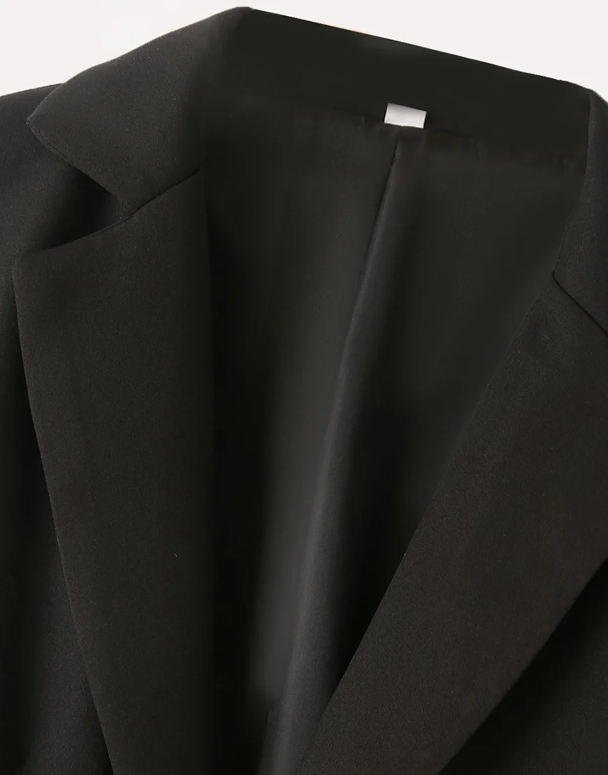 Veste de femme en noir à la mode, avec revers à encoches et une seule boucle – Image 4