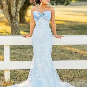 Robe de bal sirène sans bretelles avec nœud en dentelle et traîne