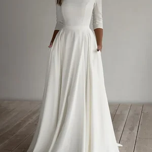 Robe de mariée longue à manches 3/4 de couleur blanche