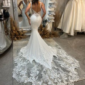 Robe de mariée sirène à col en V et fleurs en 3D avec applications en dentelle