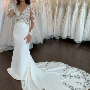 Robe de mariée ivoire sirène à manches longues en dentelle