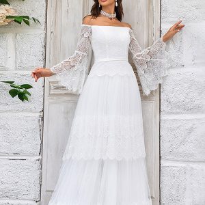 Robe de mariée ivoire à traîne et manches évasées