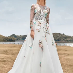 Magnifique robe de mariée ivoire à manches longues en tulle avec broderie
